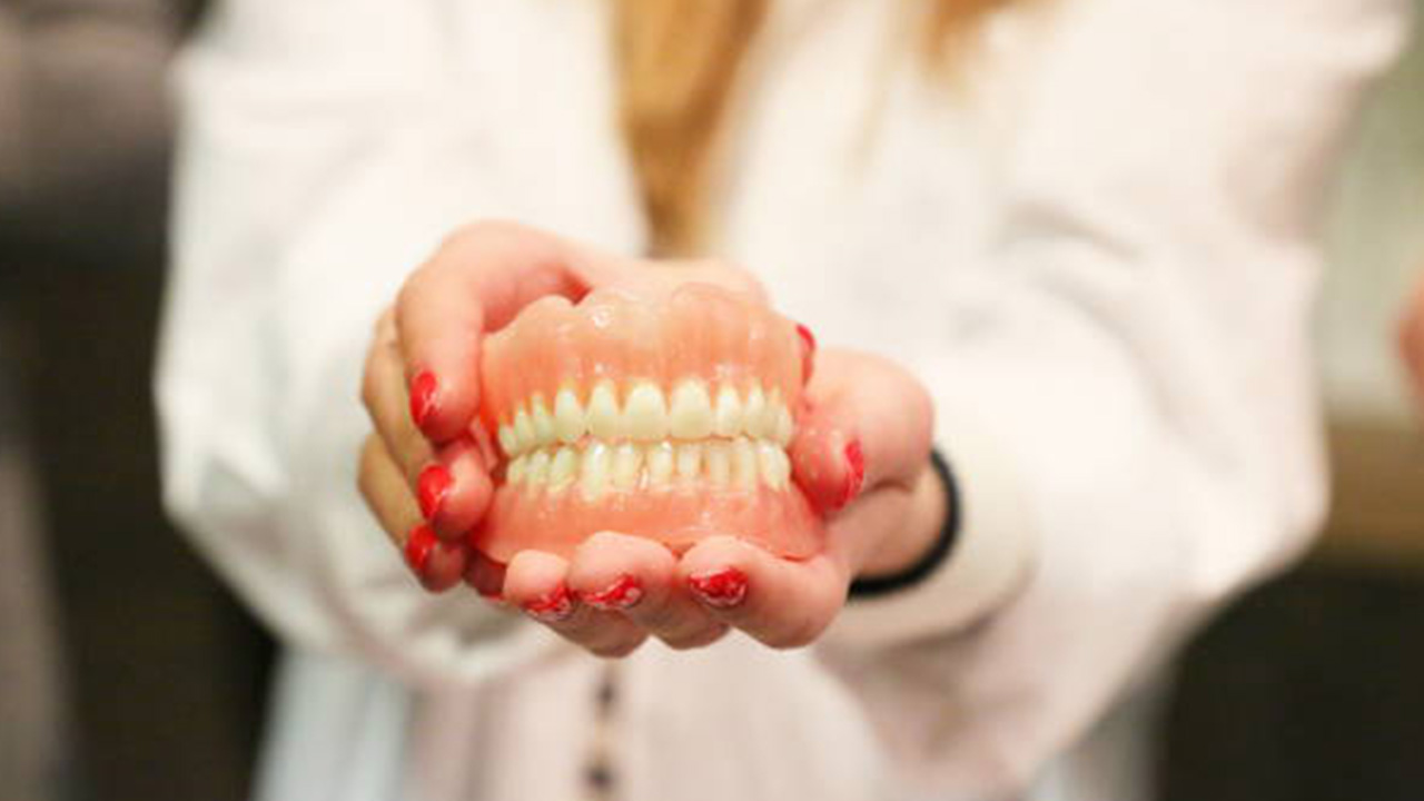 COMPLETE DENTURES